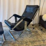 Vintage Mid Century Chrome and Black Leather Rocking Lounge Chair and Ottoman
